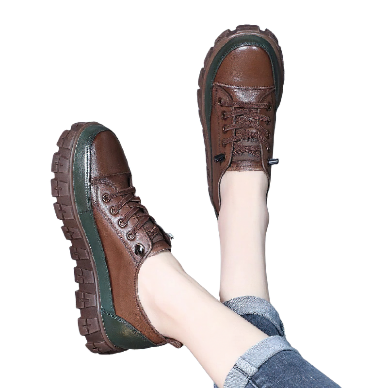 Stylish brown women's genuine leather lace-up sneakers with platform soles, perfect for casual outings.