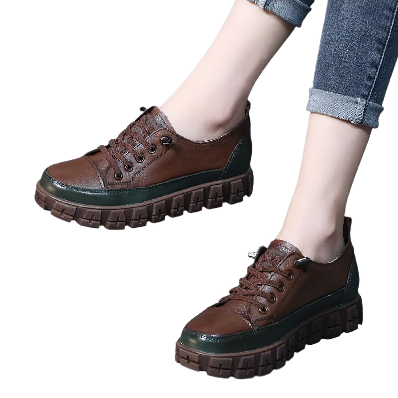 Stylish women's casual leather sneakers with round toe and lace-up design, featuring platform soles in brown.