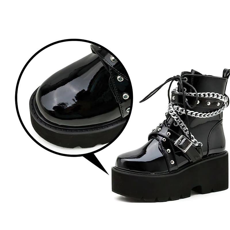 Stylish black women's boots with chain and rivets, featuring a high platform heel and glossy PU leather finish.
