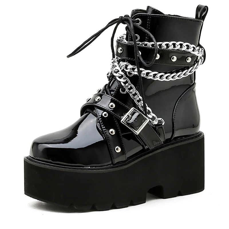 Trendy women's black PU leather boots with chains and rivets, featuring stylish square heels and plush inside.