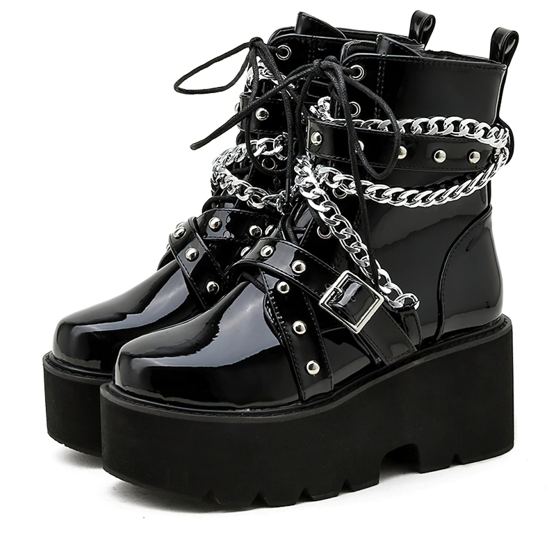 Stylish black women boots with chain and rivets, featuring a high platform heel and trendy rock style.