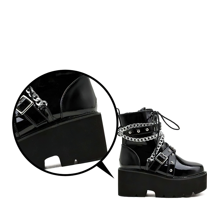 Women’s stylish black PU leather boots with chain and rivets, featuring a high platform sole and rock style design.