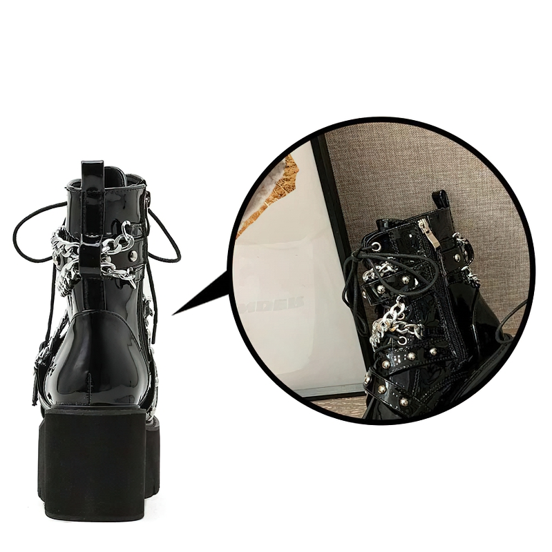 Stylish women's black boots with chain and rivets, featuring a high square heel and plush interior.