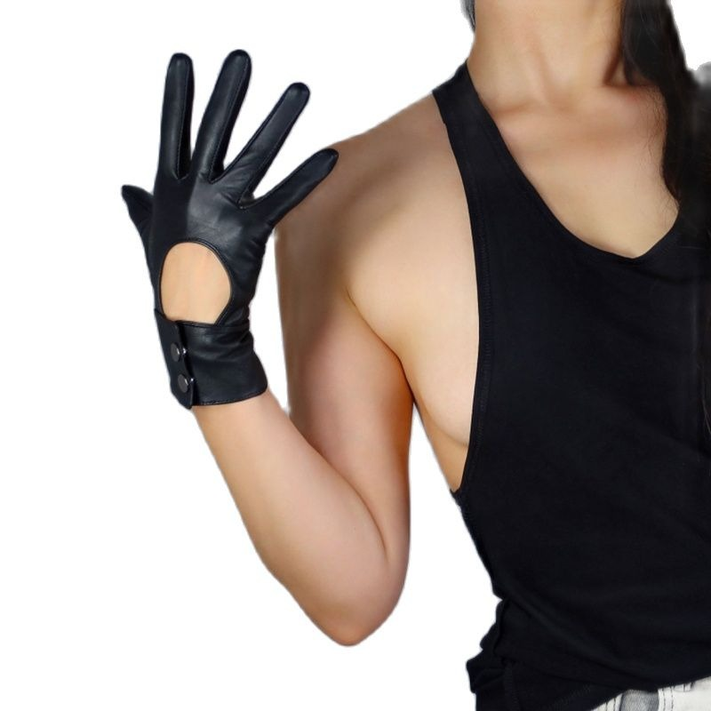 Stylish women's leather gloves with buttons showcased in an alternative fashion outfit, perfect for trendy looks.