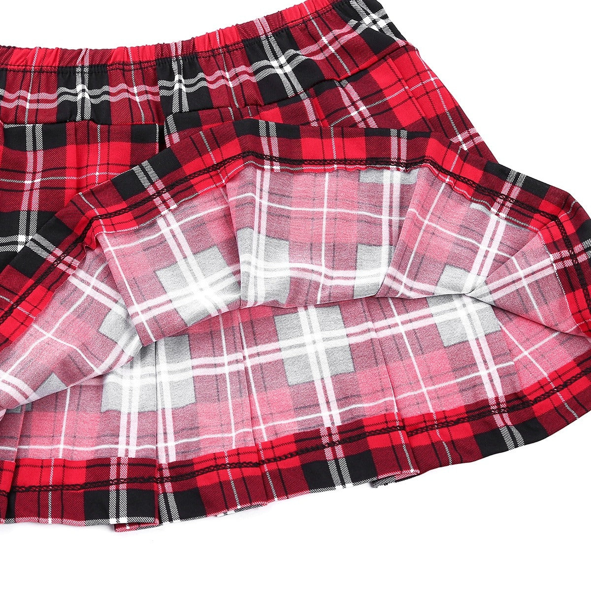 Close-up of red plaid pleated mini skirt, highlighting the layered fabric design perfect for a sexy schoolgirl cosplay costume.