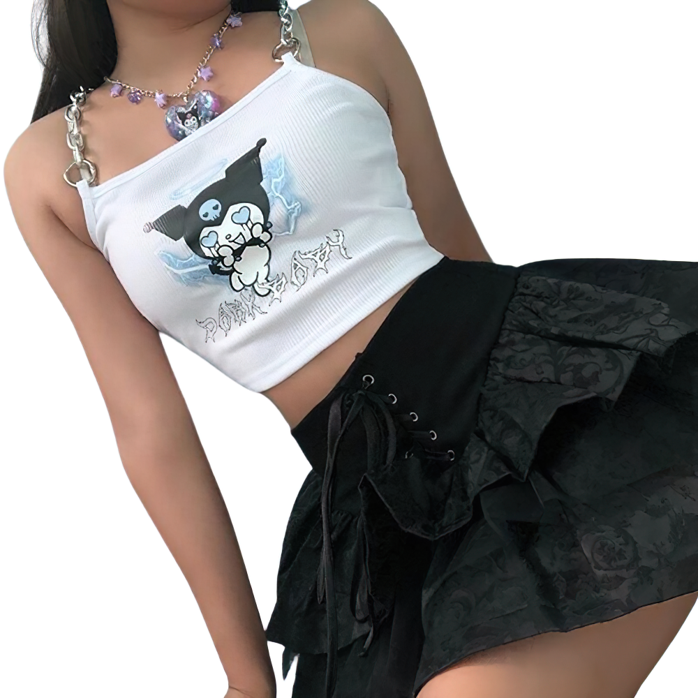 Trendy women's crop top featuring stylish graphic print and metal chain, paired with a chic black skirt.