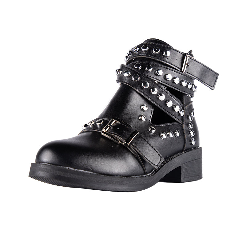 Stylish women's black ankle boots with rivets and buckle straps, perfect for a rock chic look.