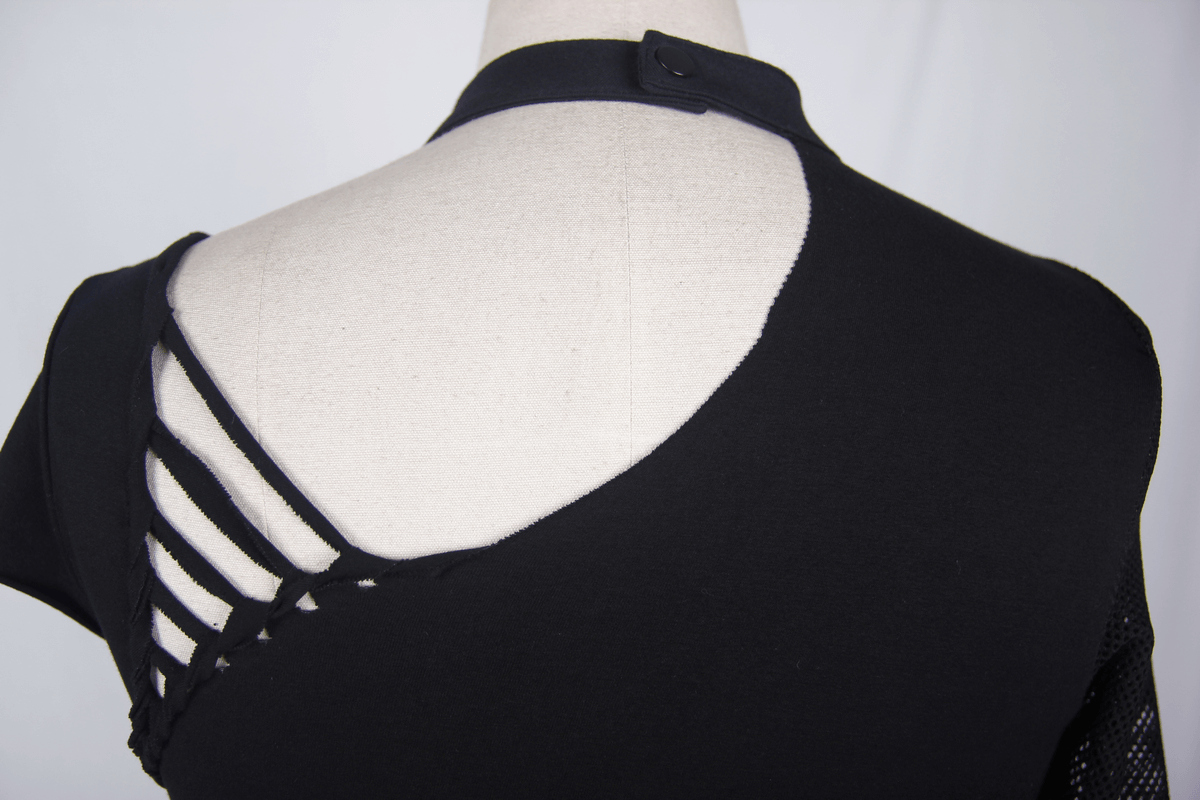 Close-up of the back of a women's black asymmetrical top with mesh detail and skeleton design.