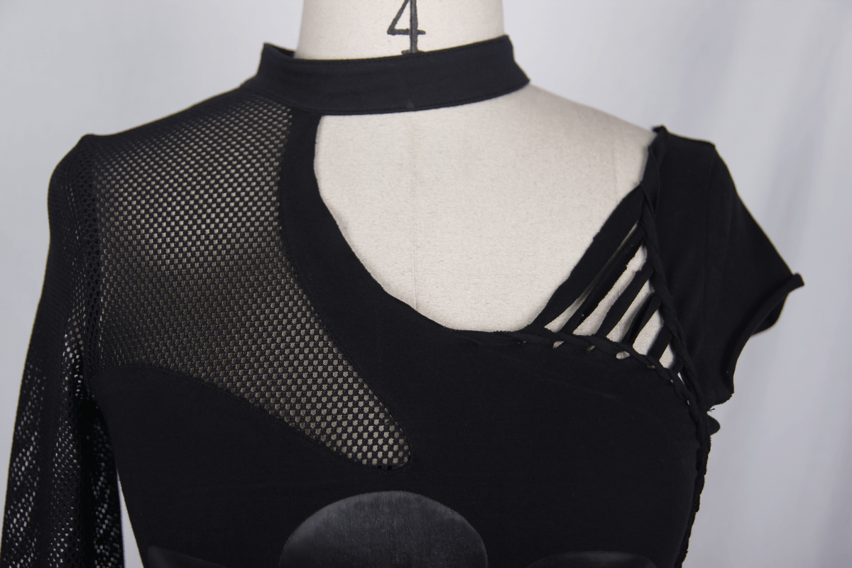 Close-up of women's gothic black asymmetrical top with mesh and skeleton details.