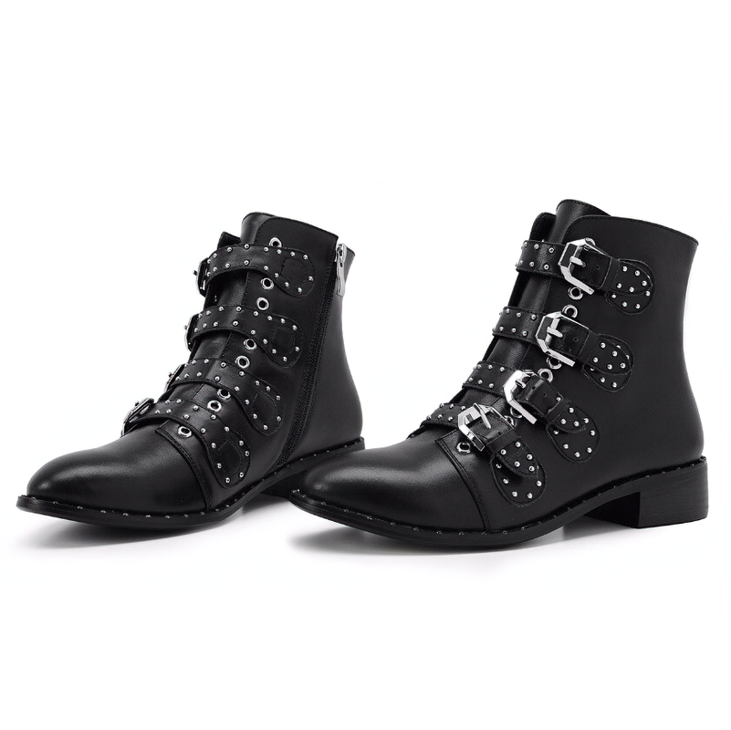 Women's black ankle boots with low heel and metal rivets, featuring unique zipper and strap design for a rock-inspired look.