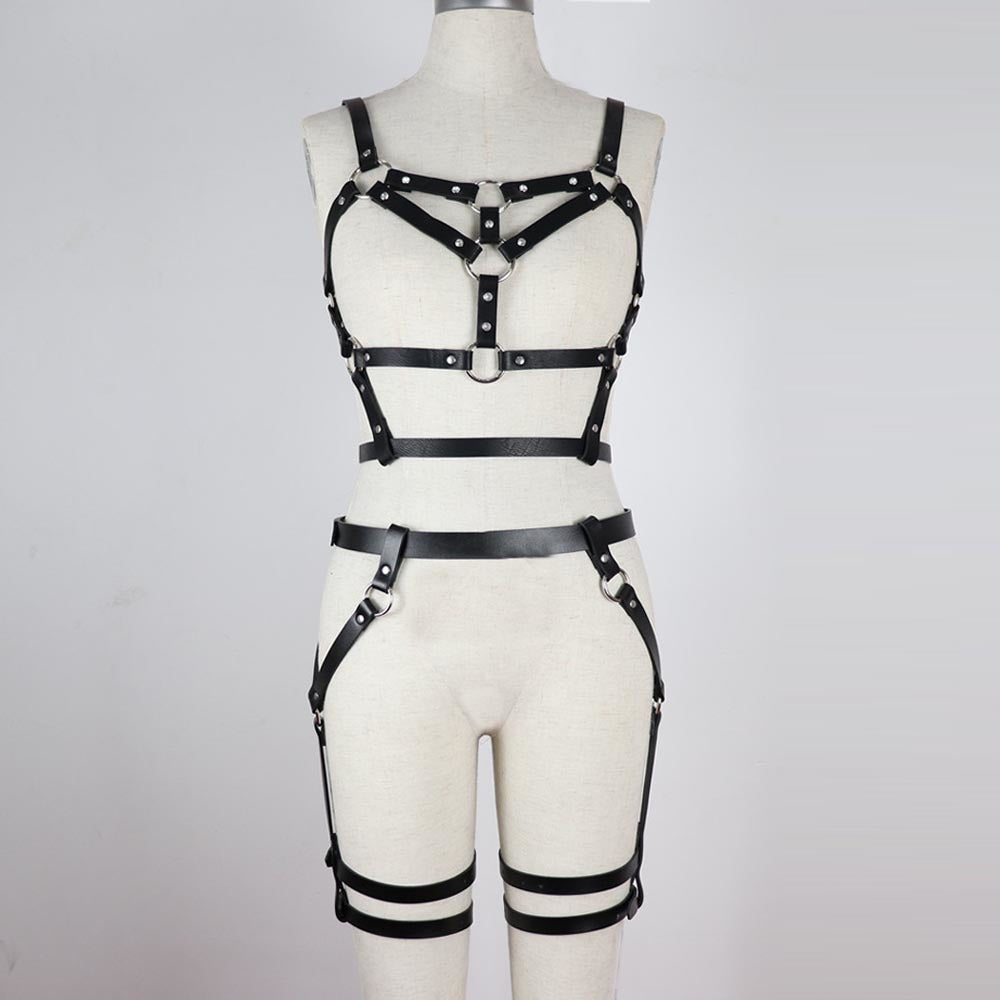 Women's adjustable faux leather body harness with metal rivets, perfect for stockings and enhancing femininity.