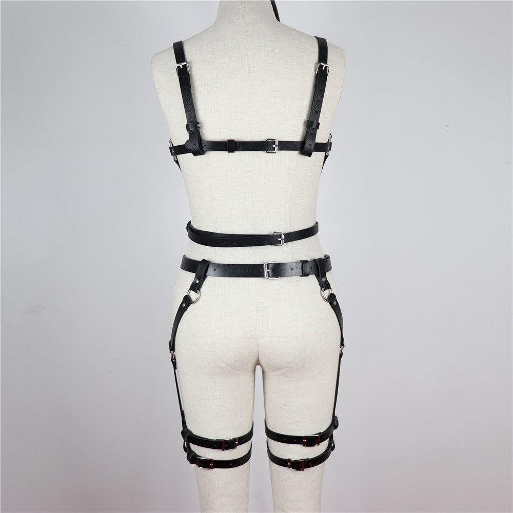 Back view of a women's adjustable faux leather body harness belt for stockings, highlighting its straps and metal details.