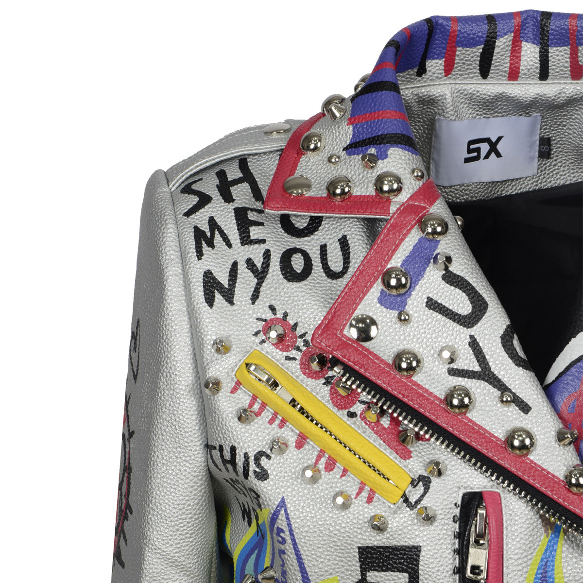 Close-up of women's motorcycle leather jacket with graffiti, rivets, and zippers for a stylish biker look.