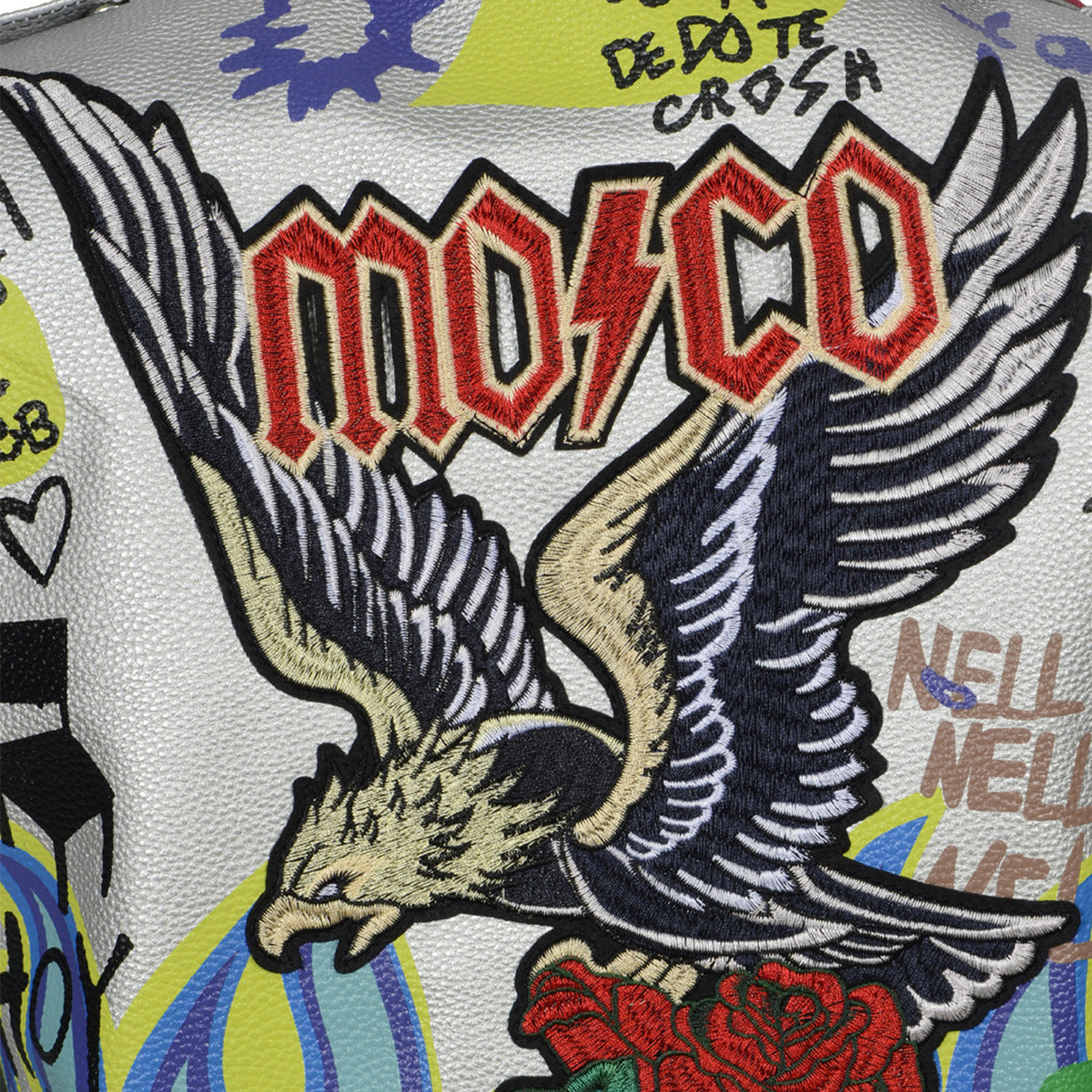 Close-up of a silver leather jacket featuring a striking eagle print and vibrant graffiti designs.
