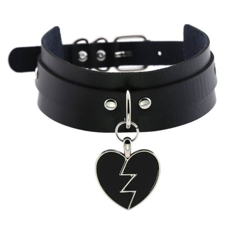 Women's black leather gothic choker necklace with a heart-shaped pendant and silver accents, perfect for rock fashion.