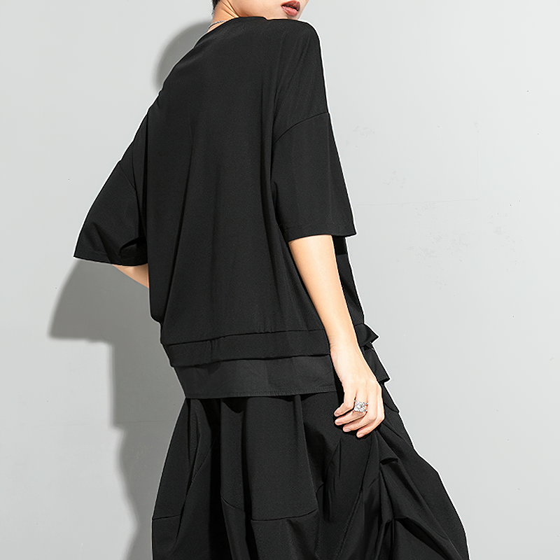 Stylish women's black irregular ribbon t-shirt, featuring a trendy round neck and half sleeves for a chic look.