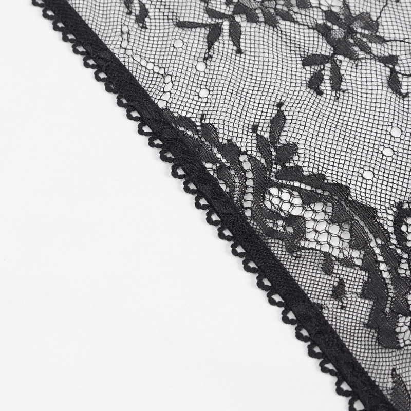 Close-up of elegant black lace fabric with floral patterns, showcasing the delicate details of gothic lingerie.