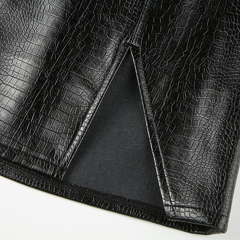 Close-up of women's black PU leather mini skirt, featuring a stylish side incision for a sexy look.