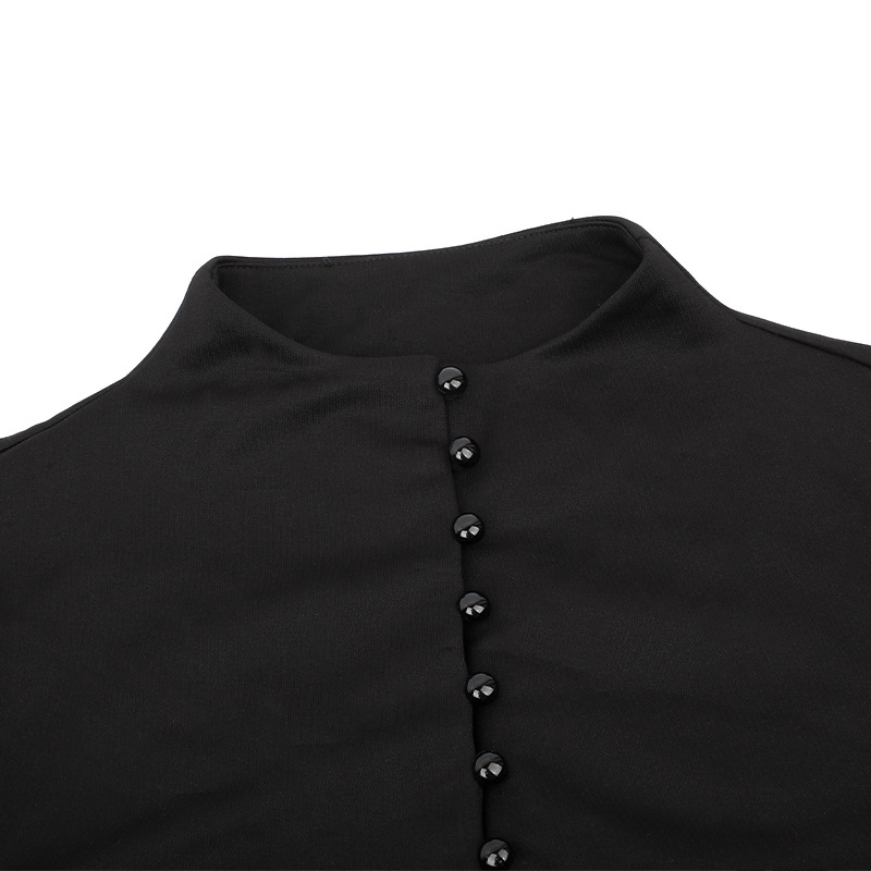 Close-up of the collar and button detail on a women's black gothic-style dress with lantern sleeves.