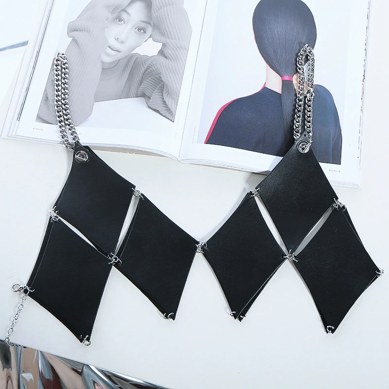 Trendy alternative black leather necklace with chain and geometric design, perfect for bold fashion statements.