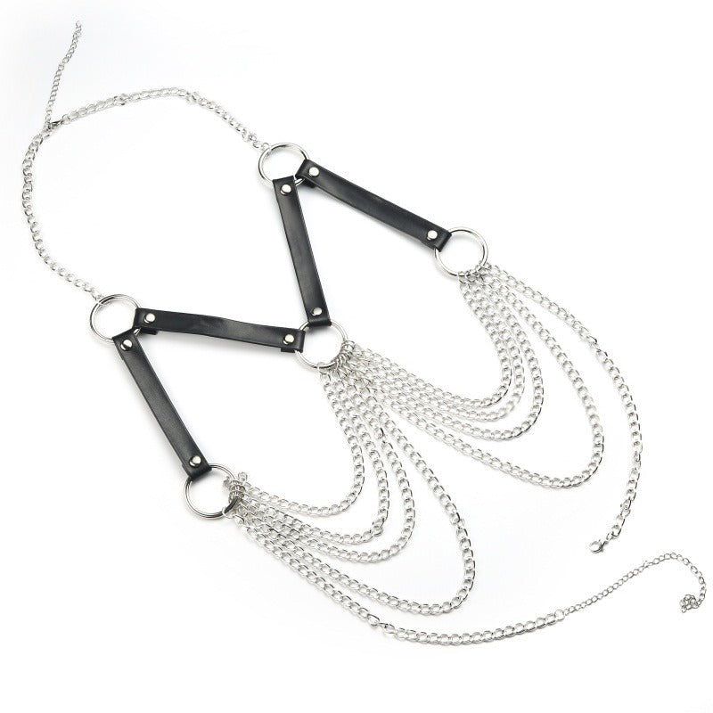 Gothic women's body bra harness with silver chains and black straps, perfect for alternative fashion styling.