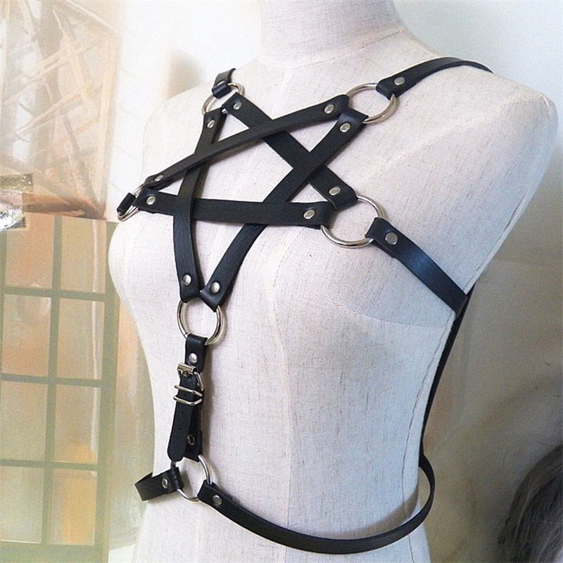 Stylish women's gothic body harness with pentagram design, perfect for cosplay and rock fashion.