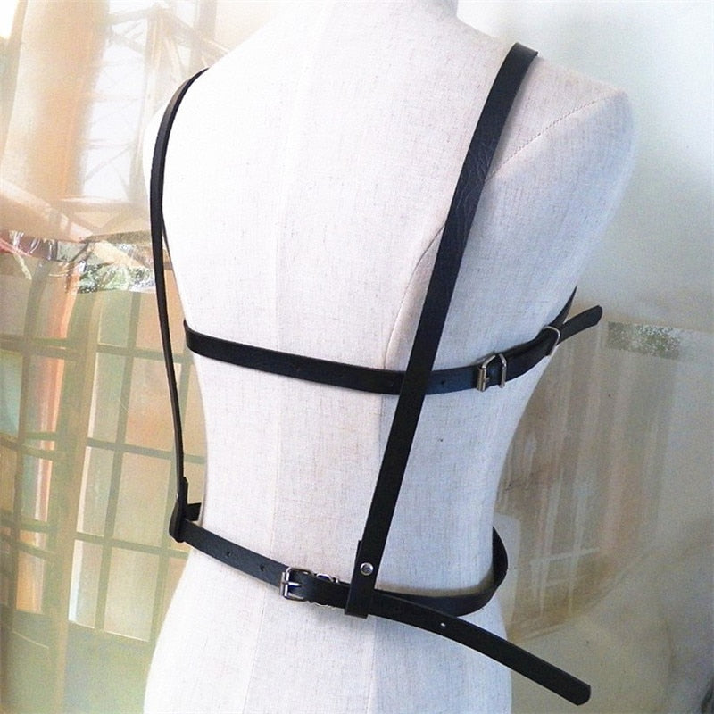 Women's Gothic body harness with pentagram design, perfect for edgy fashion and cosplay.