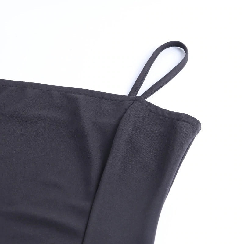 Close-up of the strap detailing on a black women's bodycon mini dress, showcasing its gothic style and sleek design.