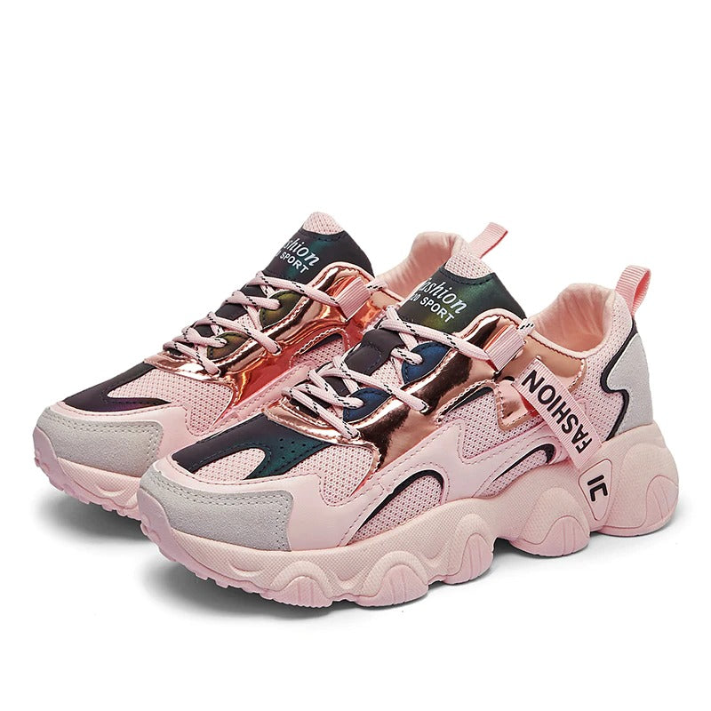 Trendy women's chunky sneakers in pink and metallic colors with breathable mesh and lace-up design.