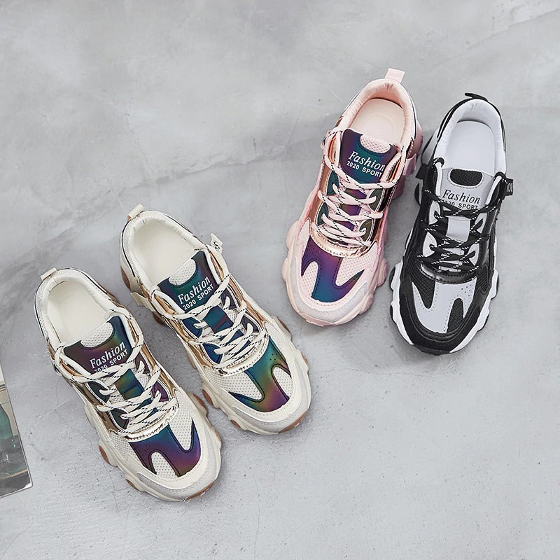 Trendy women's chunky sneakers in rainbow, pink, and black colors, showcasing a stylish lace-up design and breathable mesh.