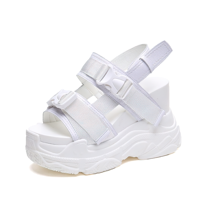 White women's platform summer sandals with buckle closure, stylish and comfortable for hot weather.