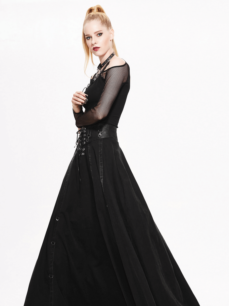 Stylish woman in a steampunk black long skirt with a high waist, showcasing vintage fashion and elegance.