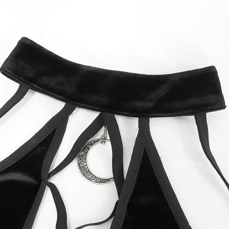 Close-up of women's gothic black crop top with crescent pendant and sleek cutout design.