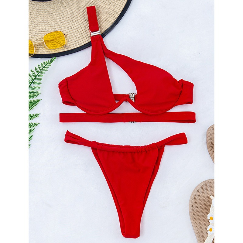 Women's red one shoulder bikini set with push-up padding, perfect for beach fun and flaunting curves.