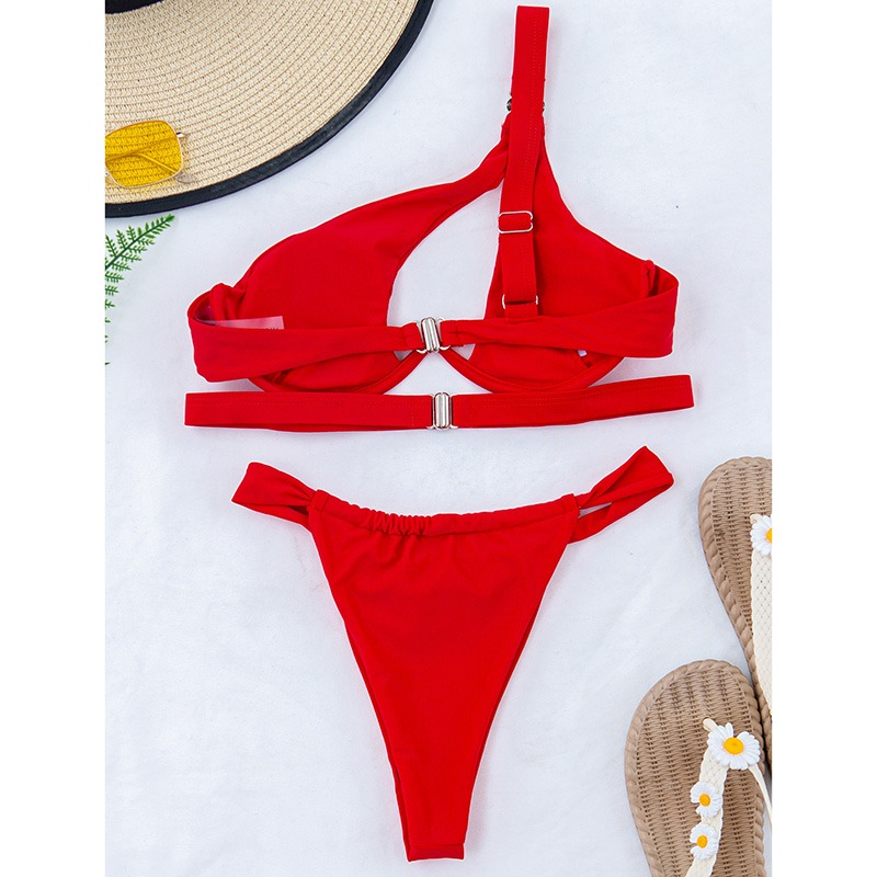 Women's cute red two-piece swimsuit with one shoulder and push-up padding, perfect for beach days.