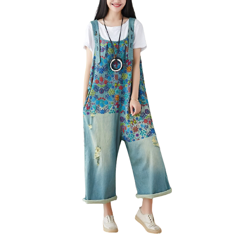 Stylish woman in floral print denim vintage pants with wide legs, featuring a unique distressed look.