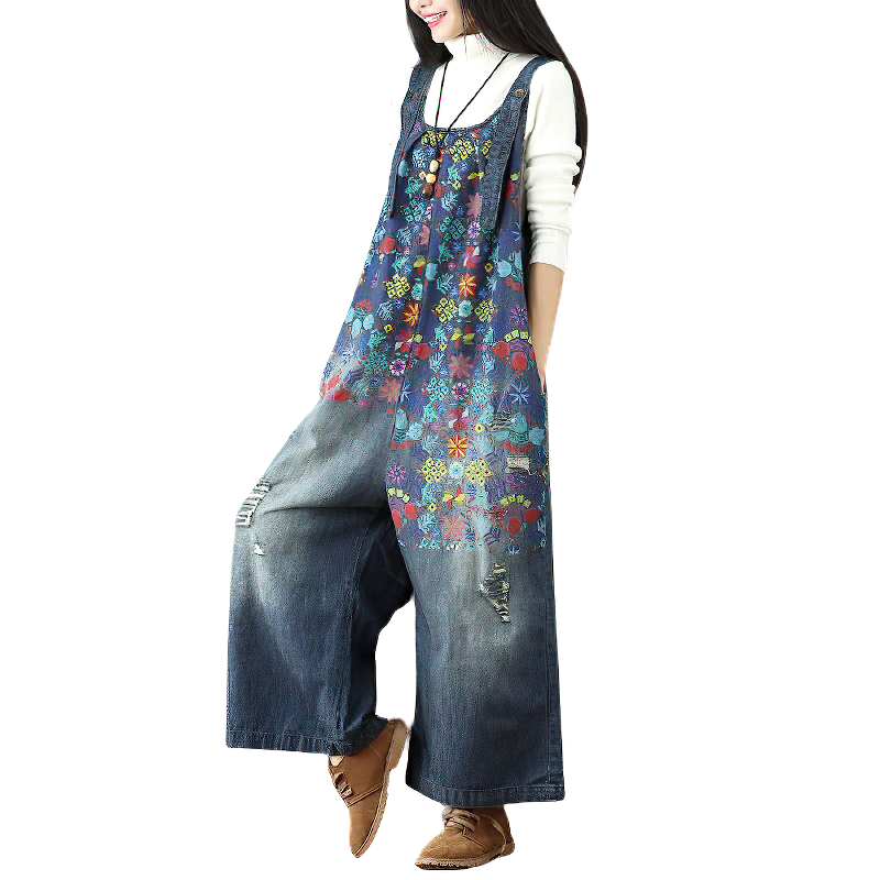 Stylish women's vintage denim jumpsuit with floral prints and wide legs, perfect for a trendy casual look.