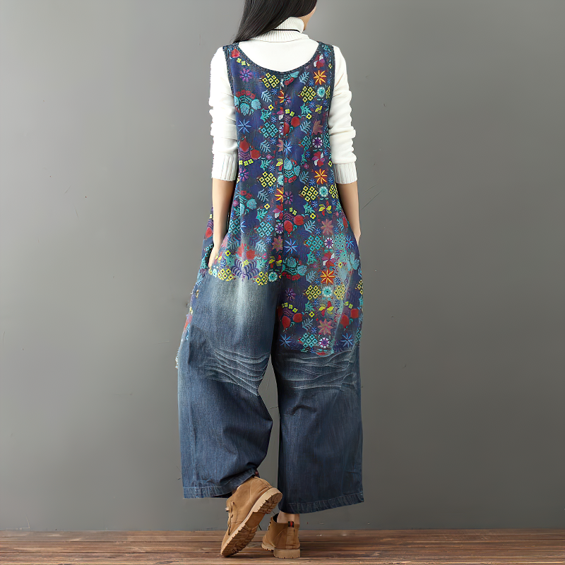 Back view of women's vintage denim jumpsuit with floral print, wide legs, and pockets, perfect for casual fashion.