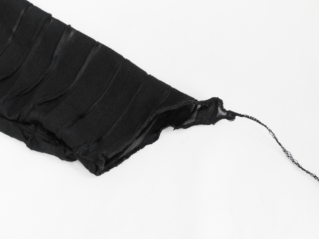Close-up of the sleeve of a women's black hoodie featuring stylish stripe design and zipper.