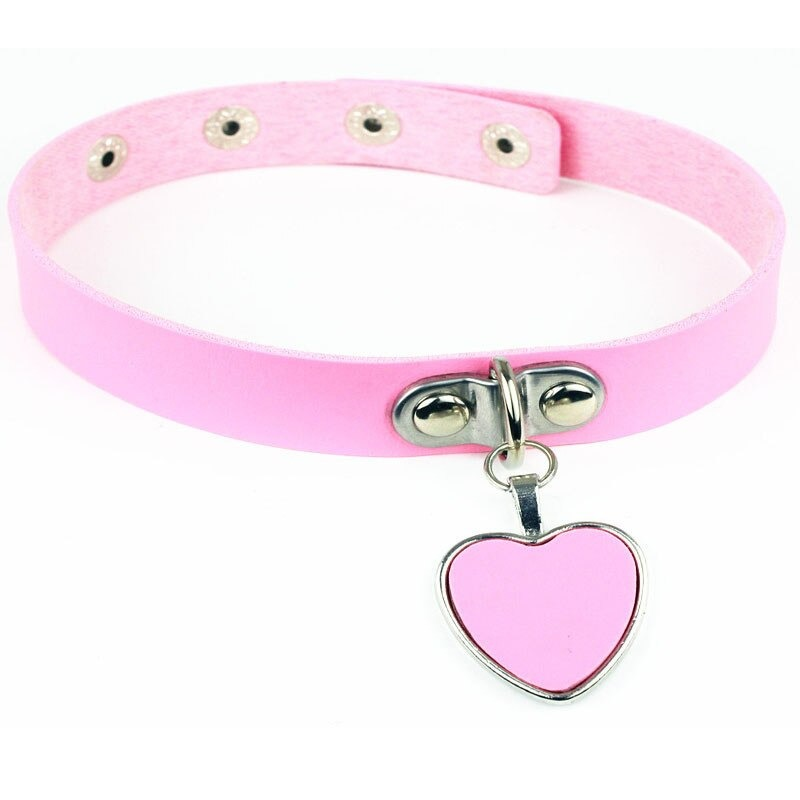Women's gothic choker with pink PU leather and heart pendant, perfect for alternative and rock outfits.