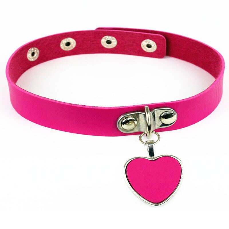 Pink PU leather choker with a silver heart pendant, perfect for gothic and alternative fashion styles.