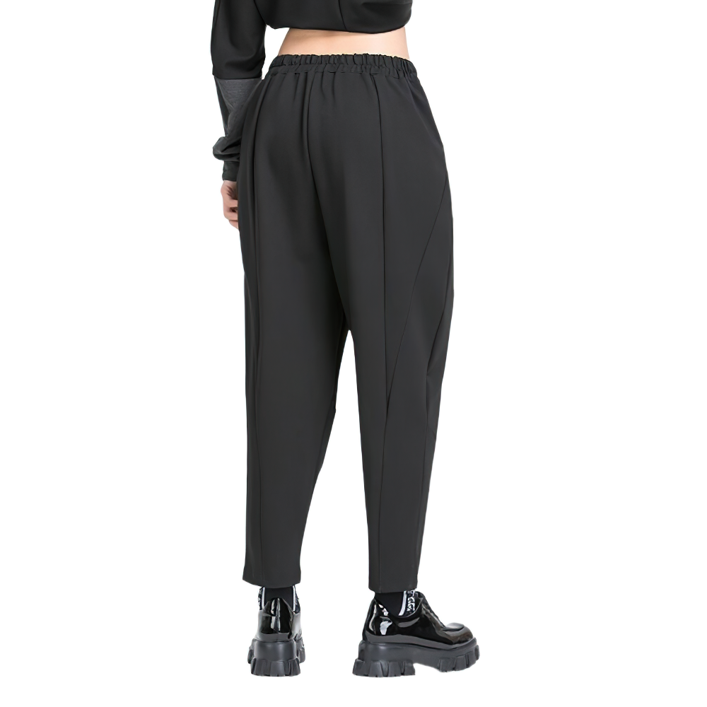 Back view of women's high waist black harem trousers with elastic waist, perfect for casual outings.