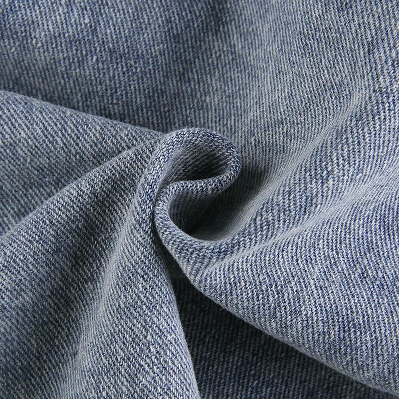 Close-up of soft denim fabric showcasing a stylish texture for women's high waist jeans skirt.