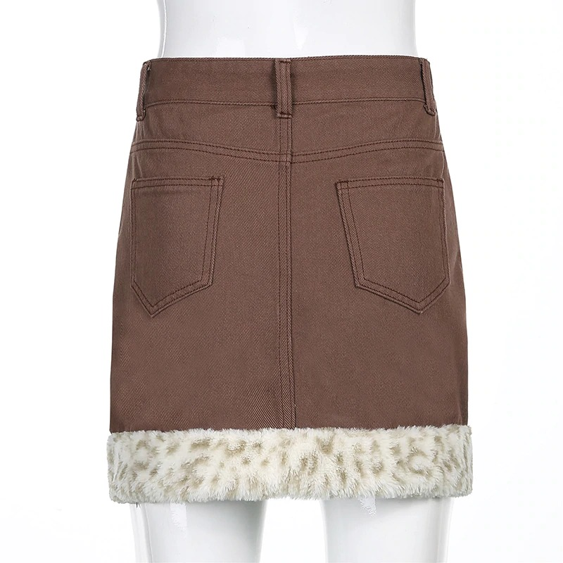 Women's leopard furry high waist mini skirt in brown with stylish fur trim details.