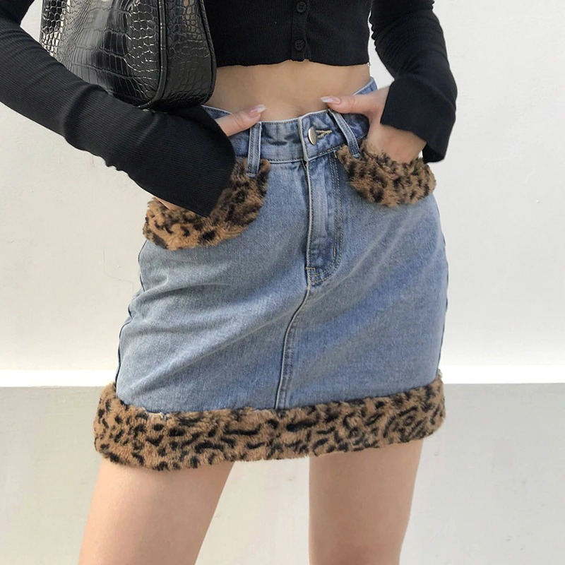 Women's high waist jeans mini skirt with furry leopard details, perfect for casual fashion.