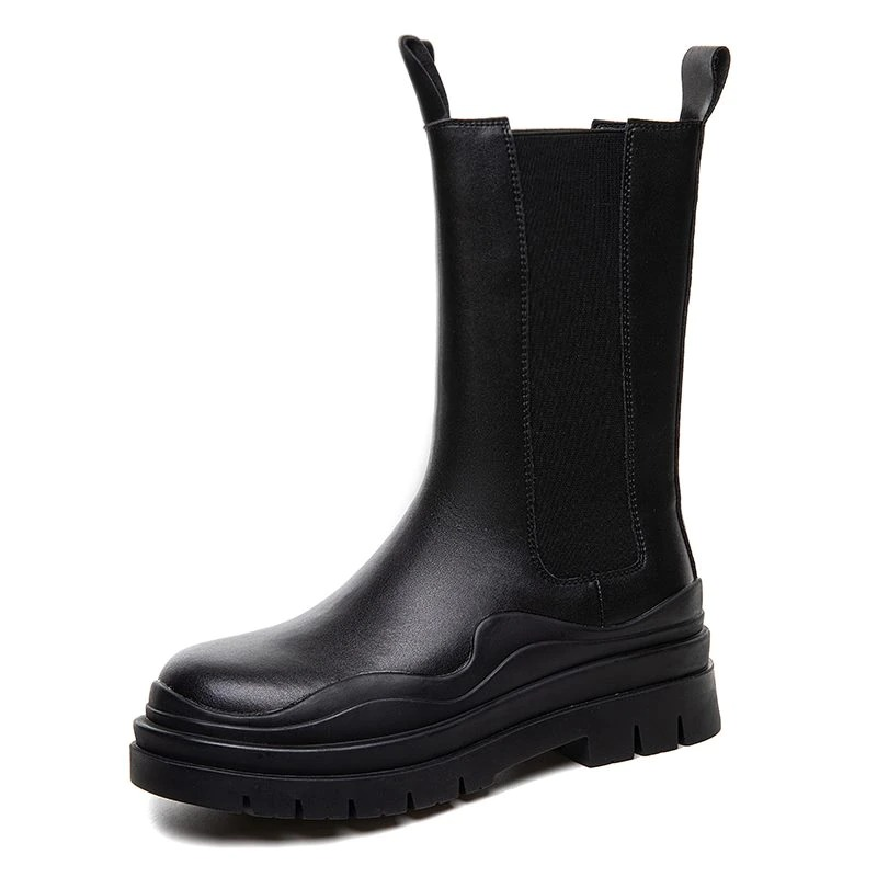 Stylish women's genuine leather boots with thick sole, perfect for all-day comfort and fashion-forward looks.