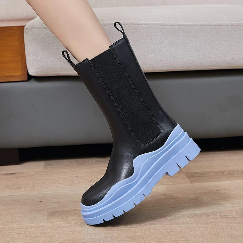 Women's genuine leather boots with thick blue sole, stylish and comfortable for everyday wear.