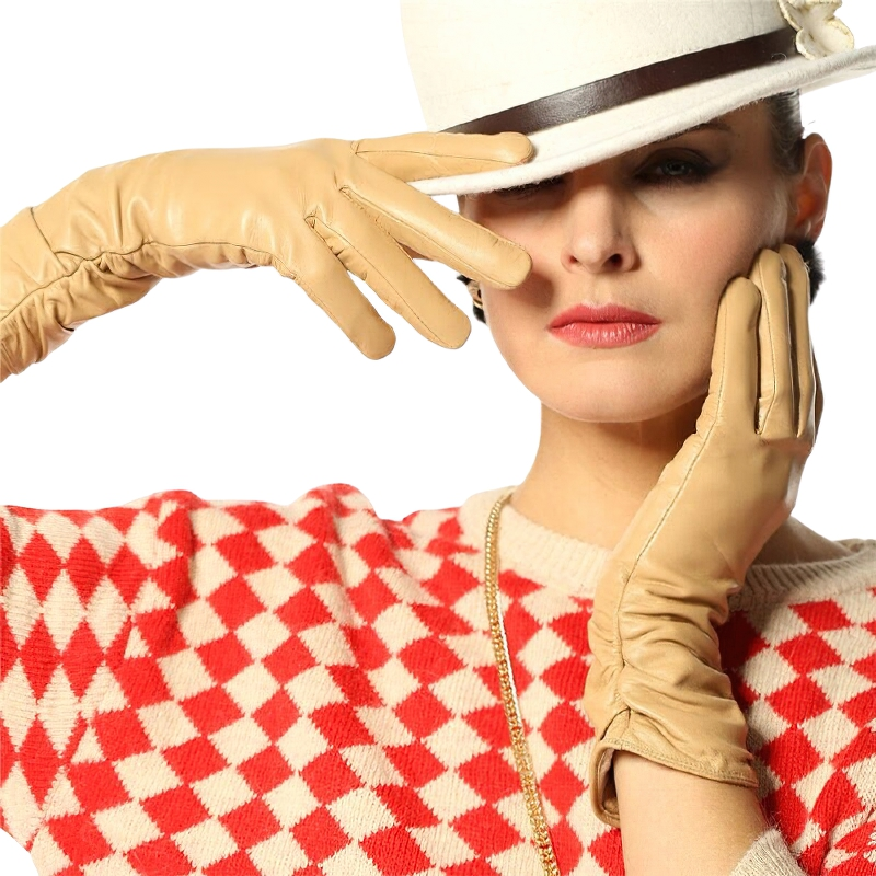 Elegant woman wearing beige genuine leather gloves, showcasing chic fashion style and warmth for cold weather.