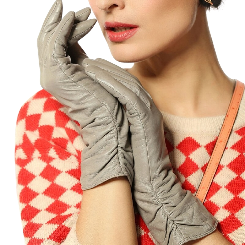 Elegant women's leather gloves in gray, featuring a stylish ruched design and a casual look for cold weather.