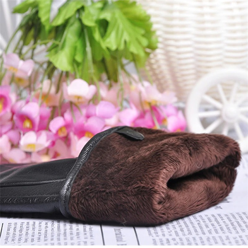 Stylish brown women's leather gloves with cozy fur lining, perfect for cold weather and casual fashion.